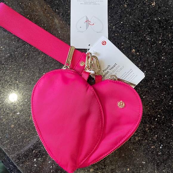 lululemon athletica Handbags - lululemon athletica Vibrant Pink Heart Wristlet